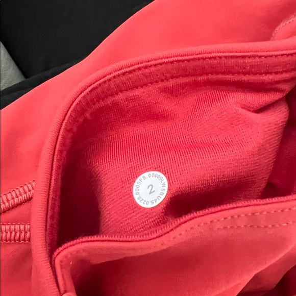 Perfect condition size 2.  Pumpkin orange color. Lululemon leggings. - Picture 7 of 7